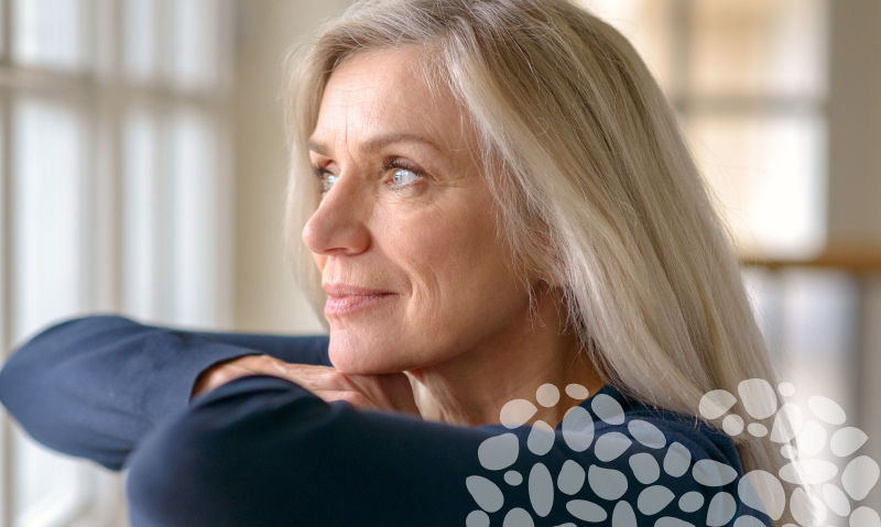 older lady looking out the window